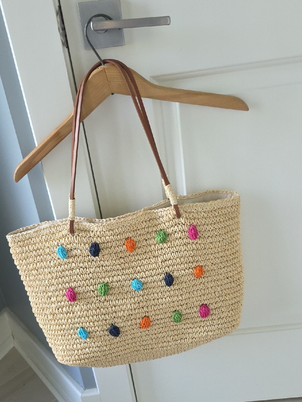 Isaac Mizrahi Woven Straw Tote Bag with Colorful Pom Accents - Tan